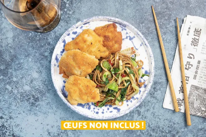 Hauts de cuisse de poulet panés coco et sésame, chou pak choy sauté au piment et citron