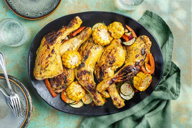 Cuisse de poulet au romarin, épis de maïs et légumes au paprika fumé