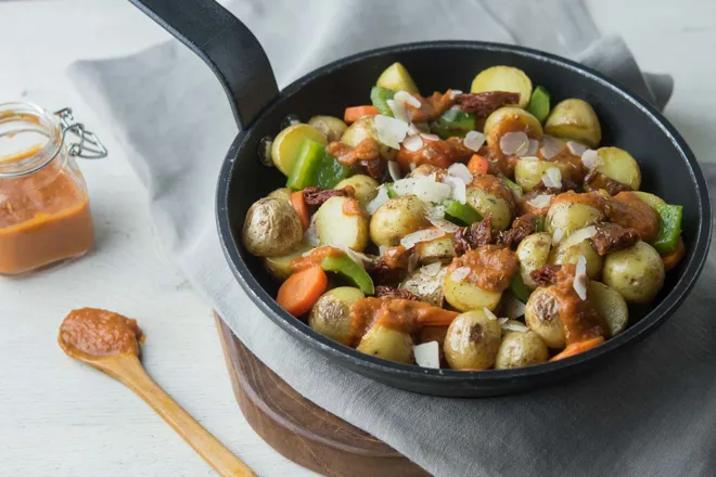 Poêlée aux tomates séchées et parmesan