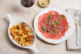 Carpaccio de boeuf aux pistaches et huile d'olive à l'ail