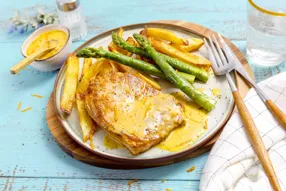 Côte de Porc à la sauce Bigarade et asperges rôties