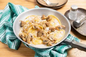 Mezzalunas à la crème de cèpes, champignons et parmesan