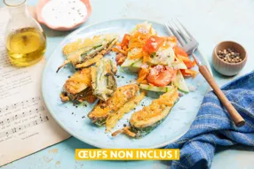 Piments Jalapenos frits au cheddar, salade de concombre et tomate