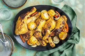 Cuisse de poulet au romarin, épis de maïs et légumes au paprika fumé